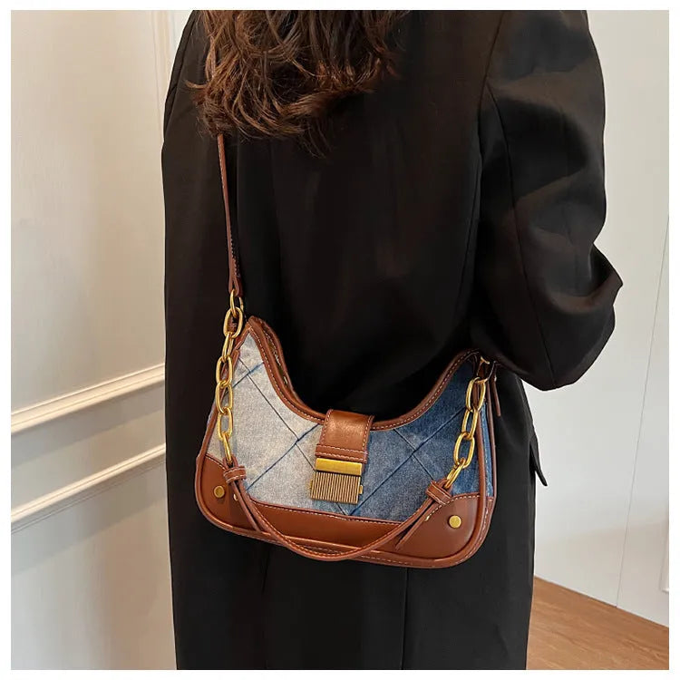 Brown denim women's bucket shoulder bag with diamond mesh chain straps and lock closure