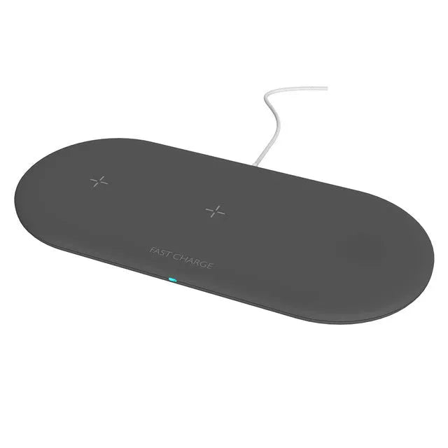 A black three-in-one desktop wireless charging station for an iPhone, an Apple Watch, and wireless headphones.