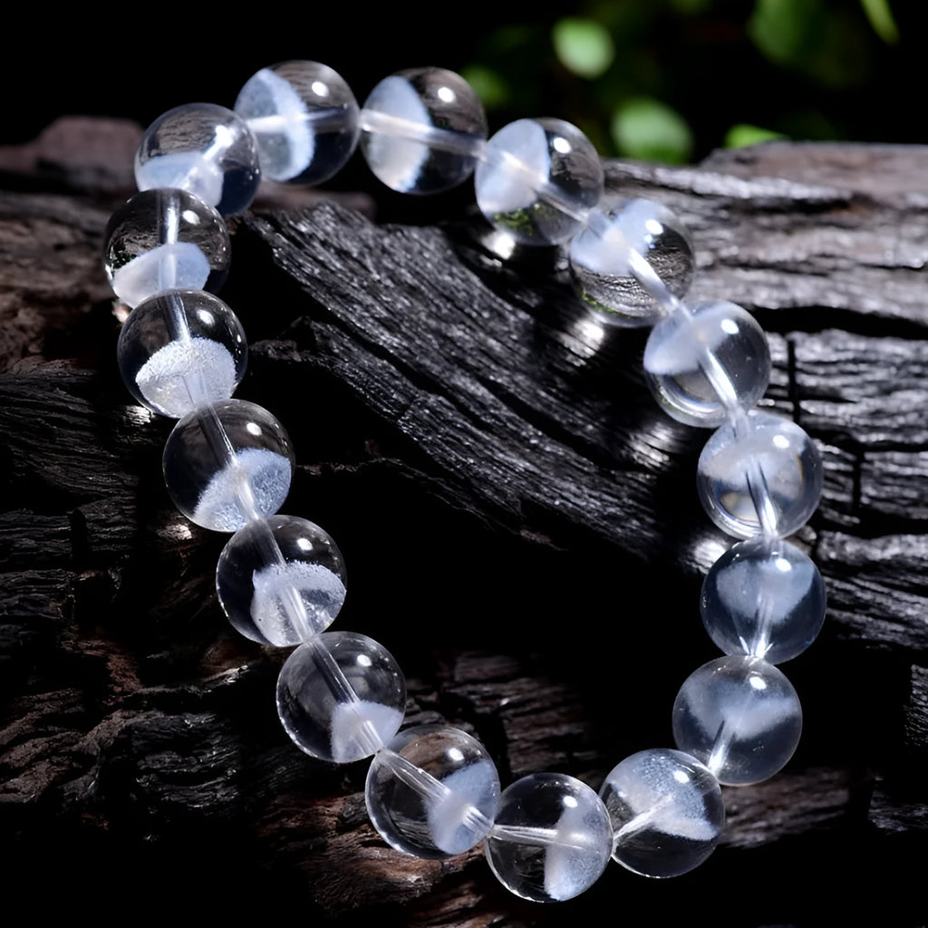 Women's white crystal ghost pyramid bracelet with Ruyi charm in graduated sizes