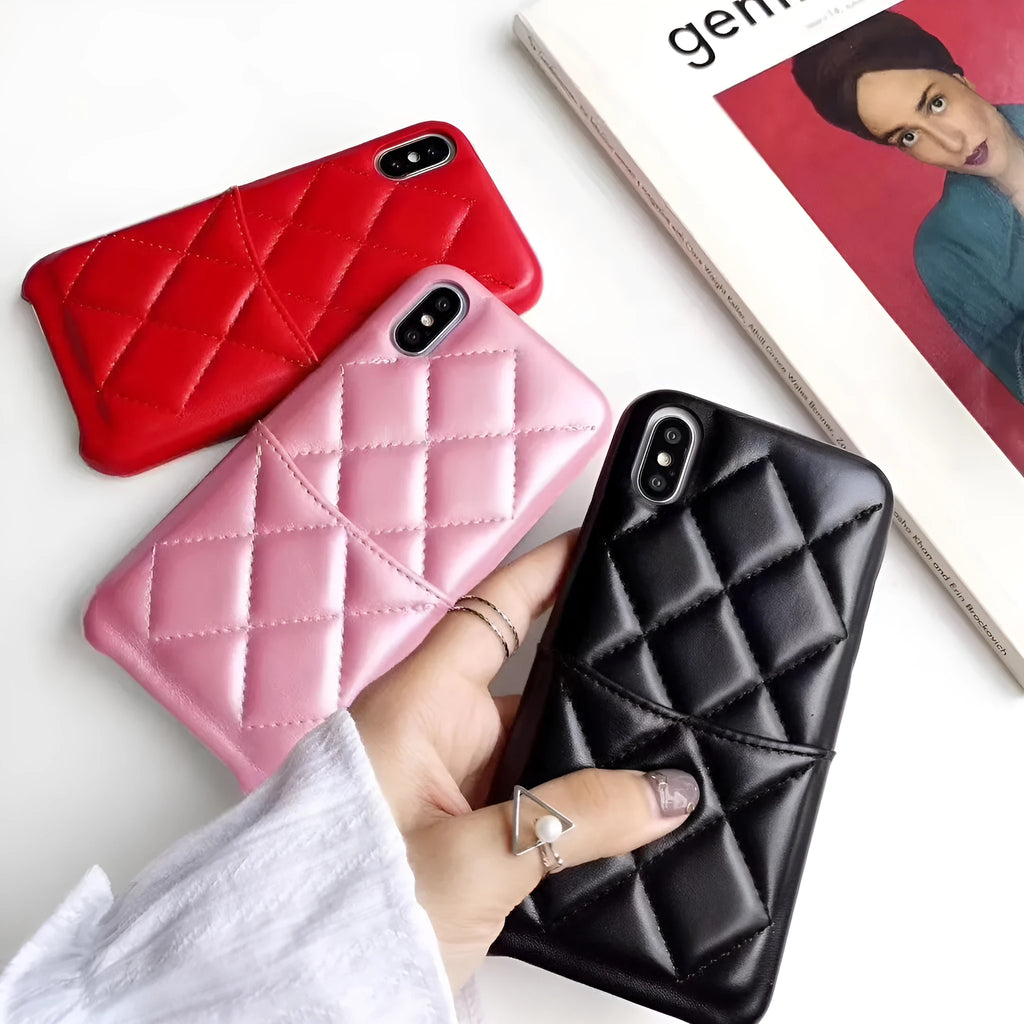 Black leather mobile phone case for iPhone XS Max on a table