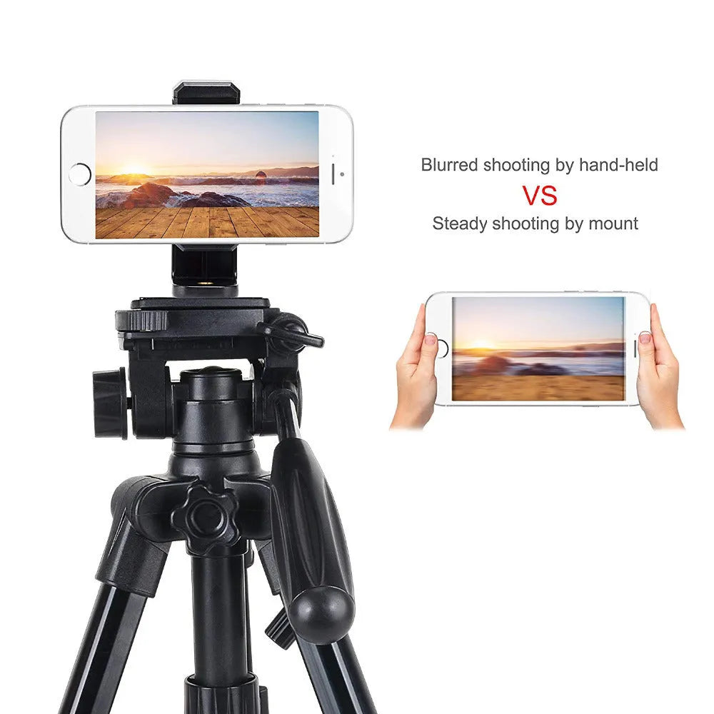 Black plastic rotating clamp phone holder with integrated note folder on a desk edge.