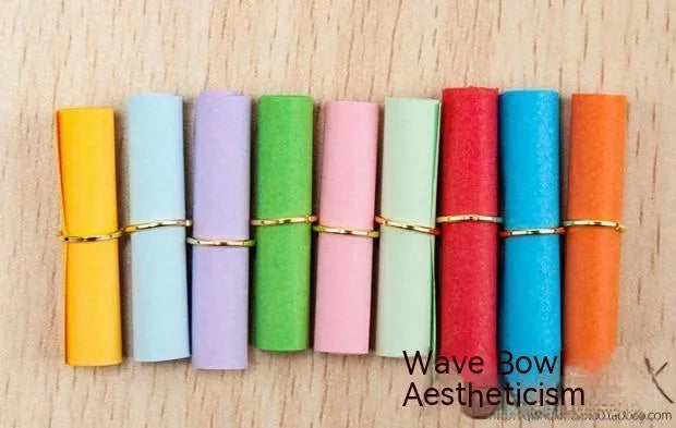 Assorted colour mini paper scrolls with eyelets for drift bottle messages and crafts.