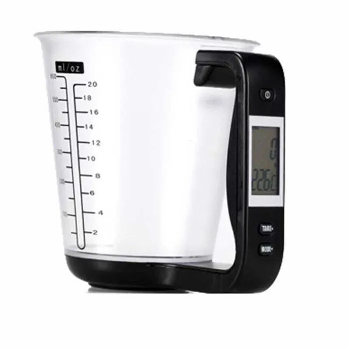 Green electronic kitchen scale measuring cup with LCD display built into handle showing weight measurement