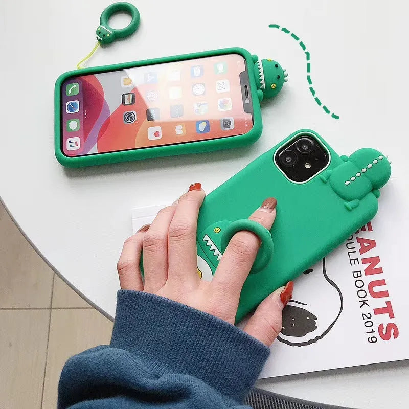 Green silicone iPhone case with cartoon animal design showing front and back views