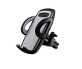 Black plastic mobile phone holder attached to car air conditioning outlet for hands-free navigation