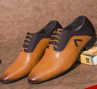 Men's black Oxford shoes with a rubber sole on a white background.