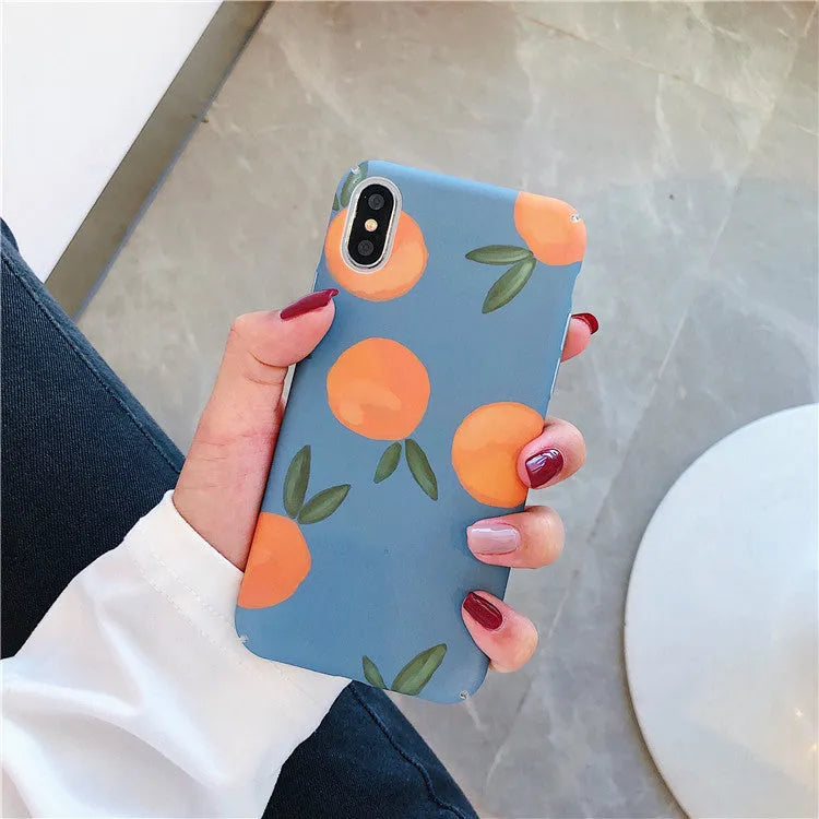 Orange retro plastic iPhone case with water and blue background design, shown as a back cover.
