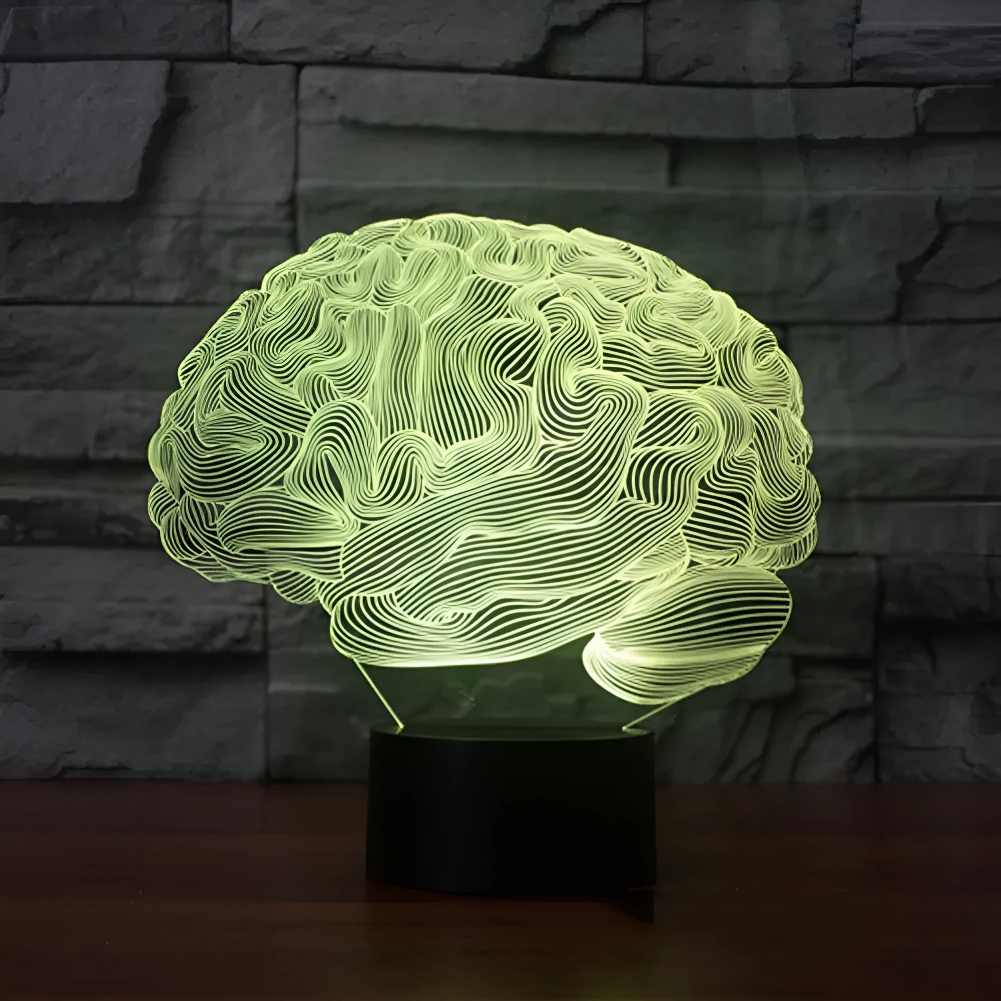 3D acrylic brain illusion LED desk lamp with colour changing remote control on wooden desk