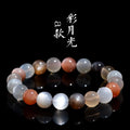 Natural colourful moonlight moonstone bracelet with 8mm beads on wrist.