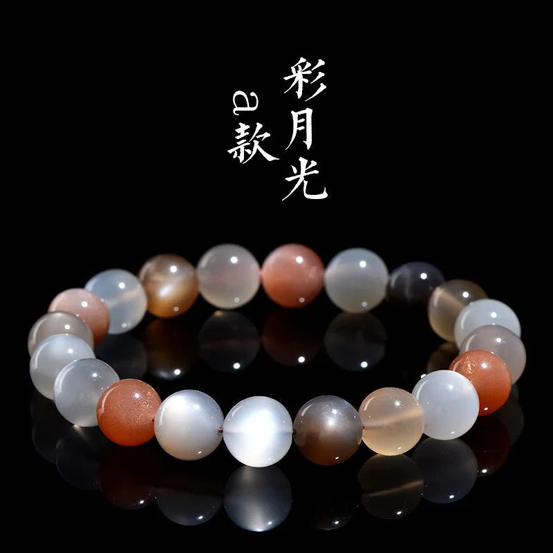 Natural colourful moonlight moonstone bracelet with 8mm beads on wrist.