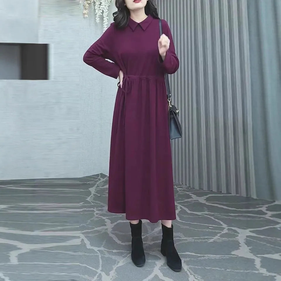 Purplish red long sleeve plus size dress for women, urban winter commute style.