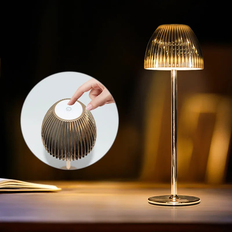 Modern dimmable USB rechargeable night lamp with thin round base in black or white colour.
