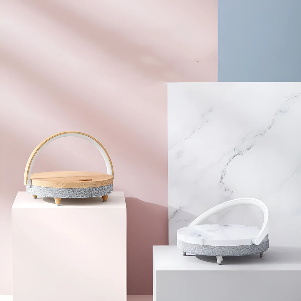 White wireless charging LED night light with Bluetooth speaker and phone holder in marble pattern finish