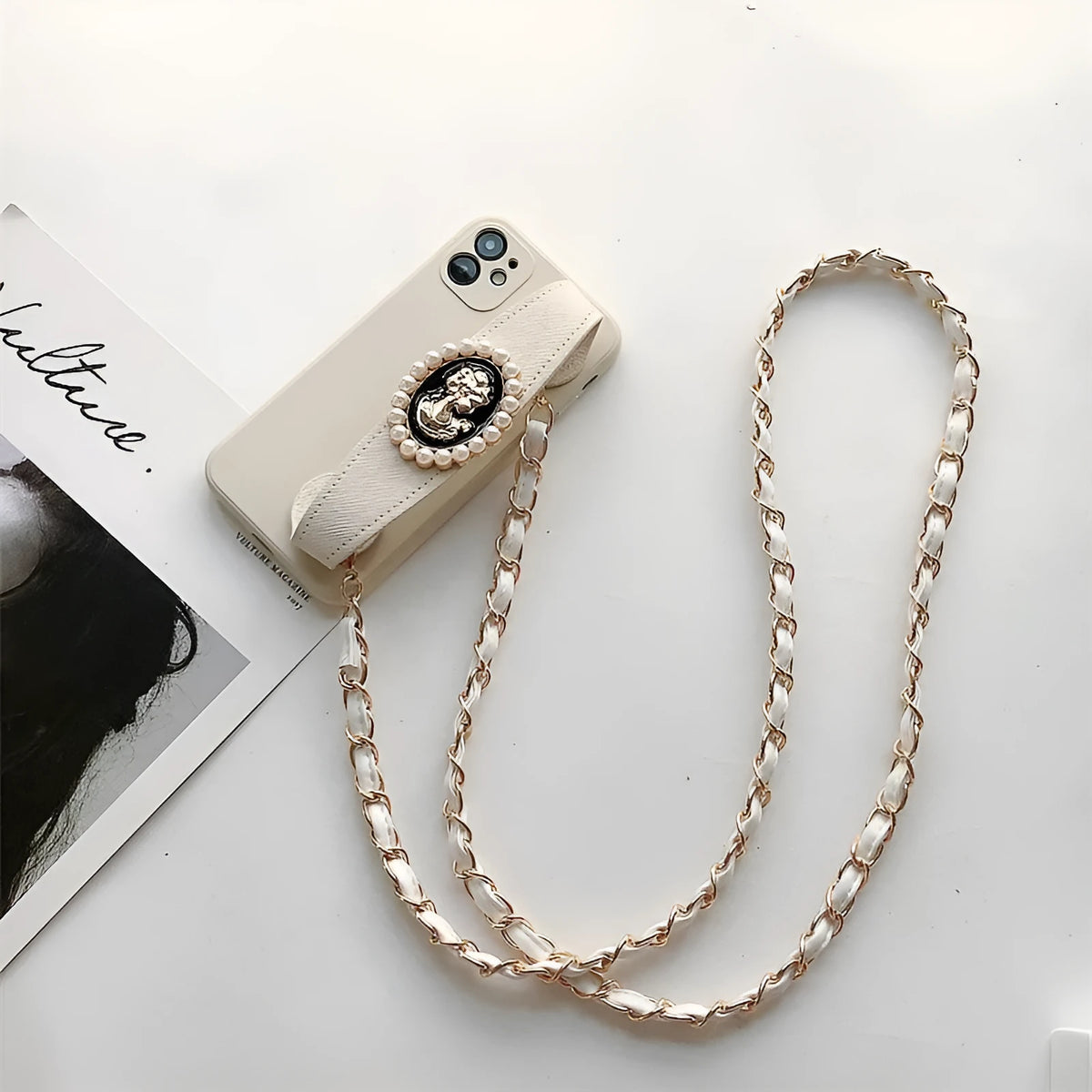 White TPU back cover phone case with wrist strap and crossbody chain for iPhone, shown with included lanyard.