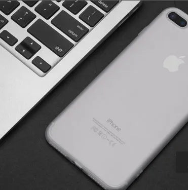 Silicone and TPU mobile phone case for Apple iPhone on a table in black, blue, red, and white colour options.