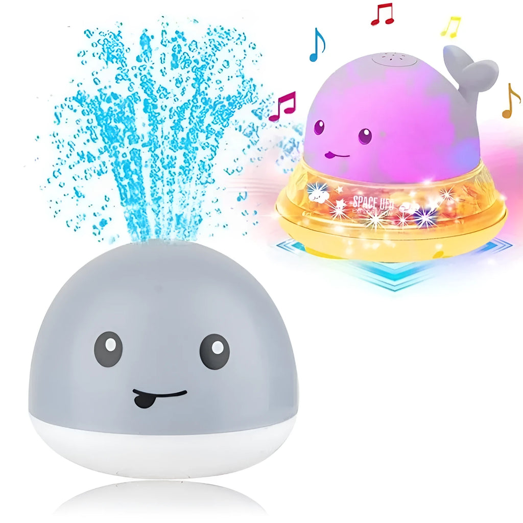 White and blue electric whale bath toy spraying water with flashing lights on base.