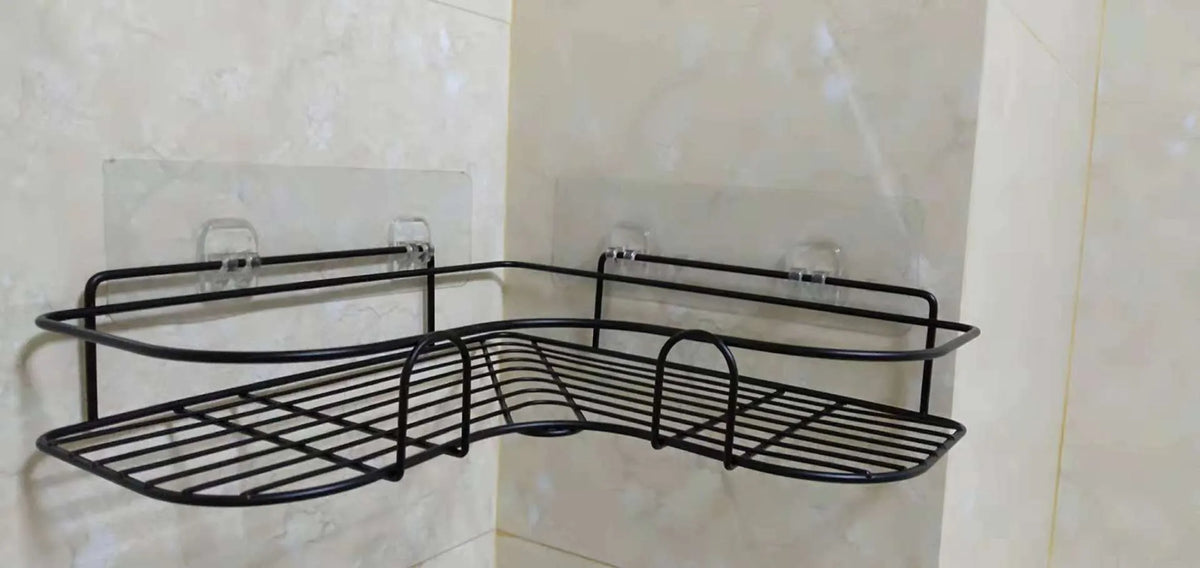 Punch-free iron single-layer corner rack for bathroom and kitchen storage in white or black with suction stickers.