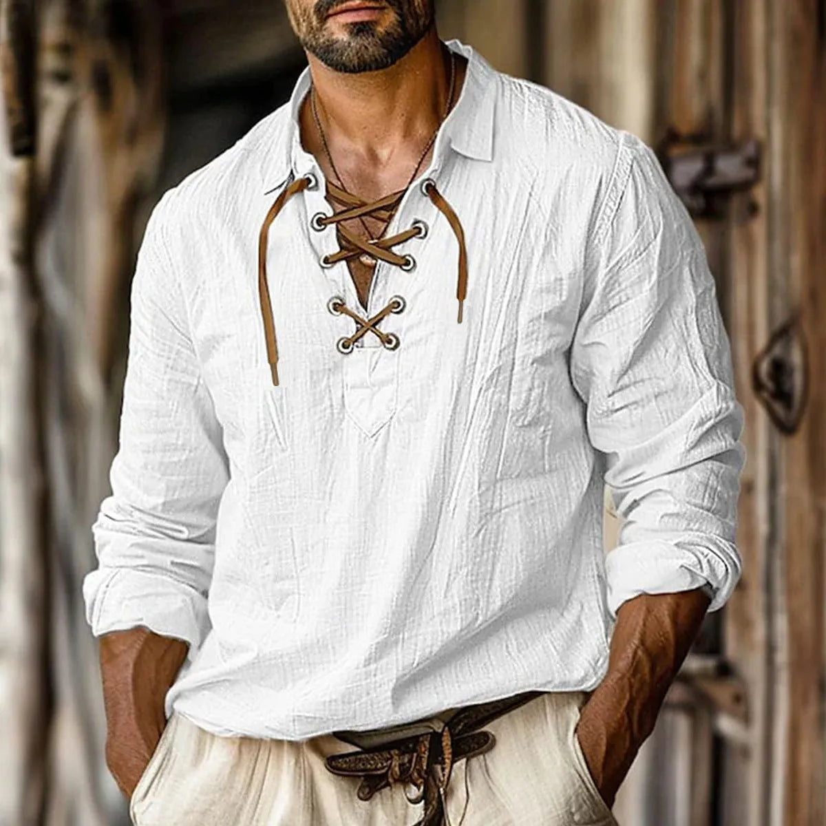 Men's loose fit blue linen blend shirt with lace-trimmed lapel collar and long sleeves.