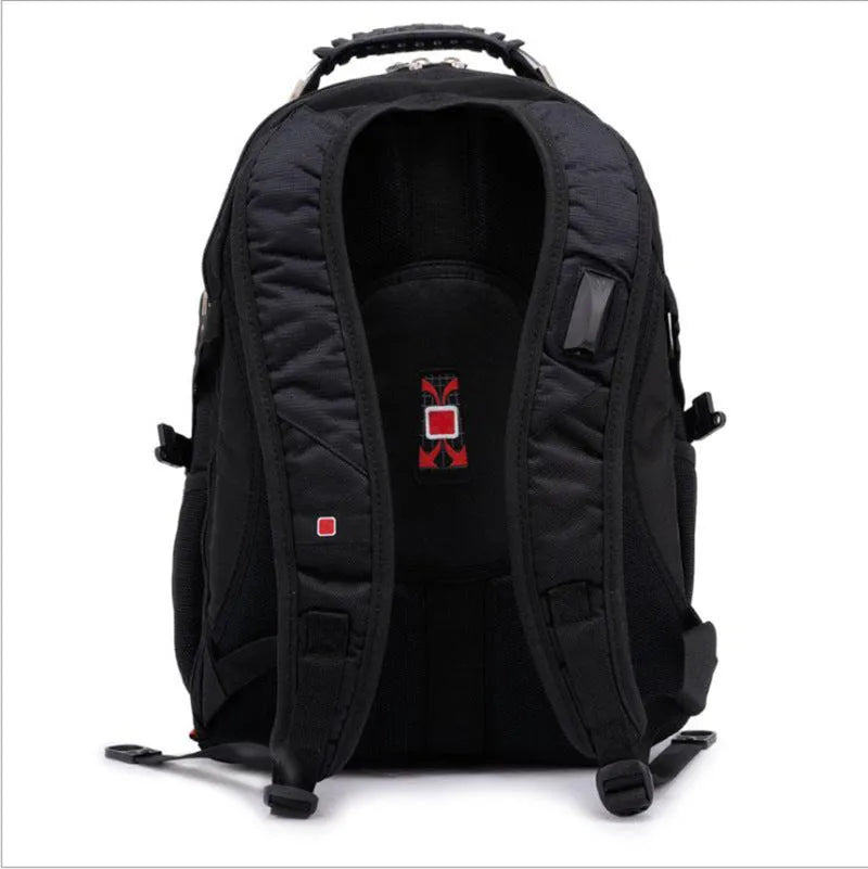 Black 38-litre business laptop backpack open to show three internal compartments and organiser pockets.
