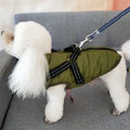 Waterproof dog coat with integrated harness in rain silk fabric showing size range from XS to 4XL