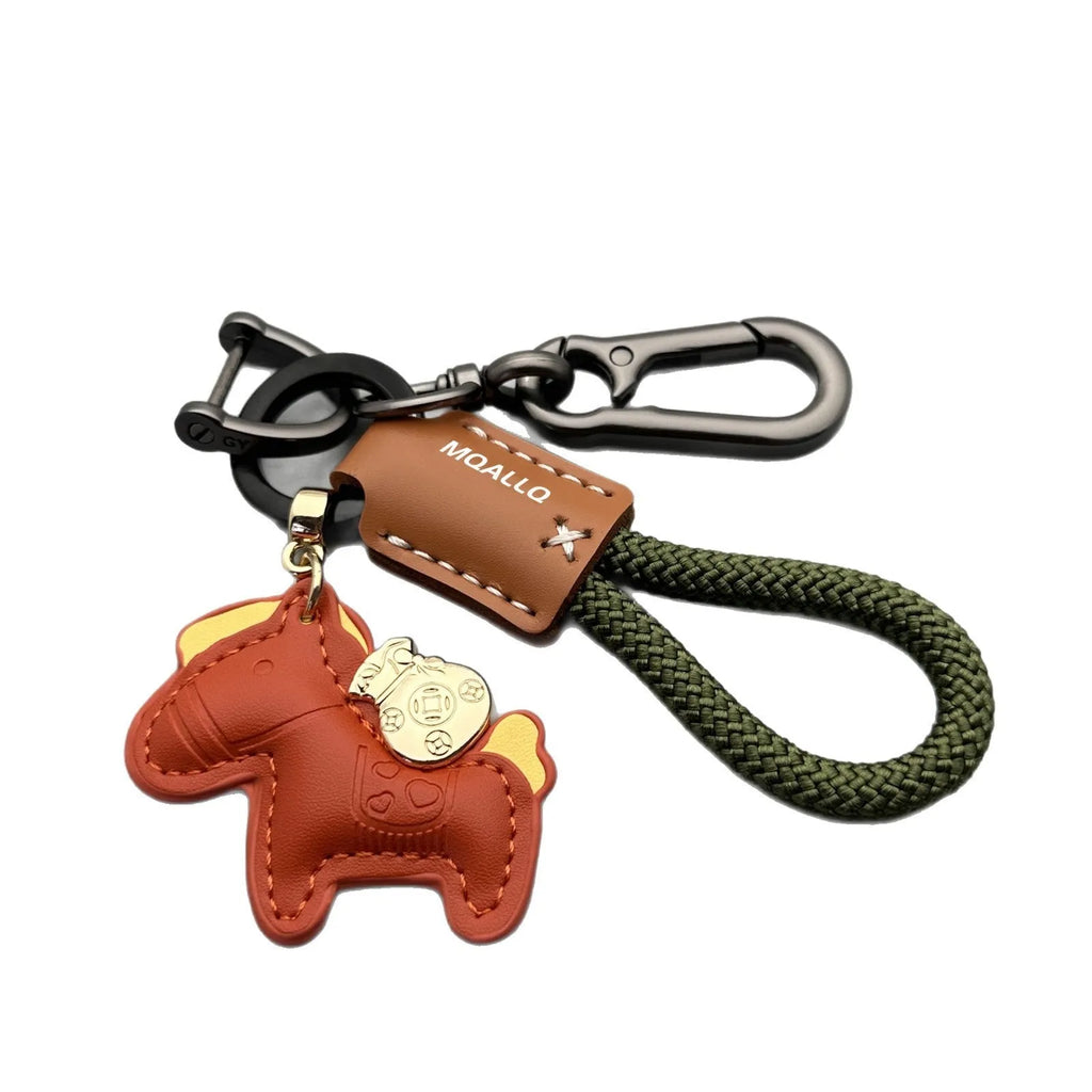Handmade cowhide leather key ring pendant with zinc alloy pony buckle and coloured flanelle rope.