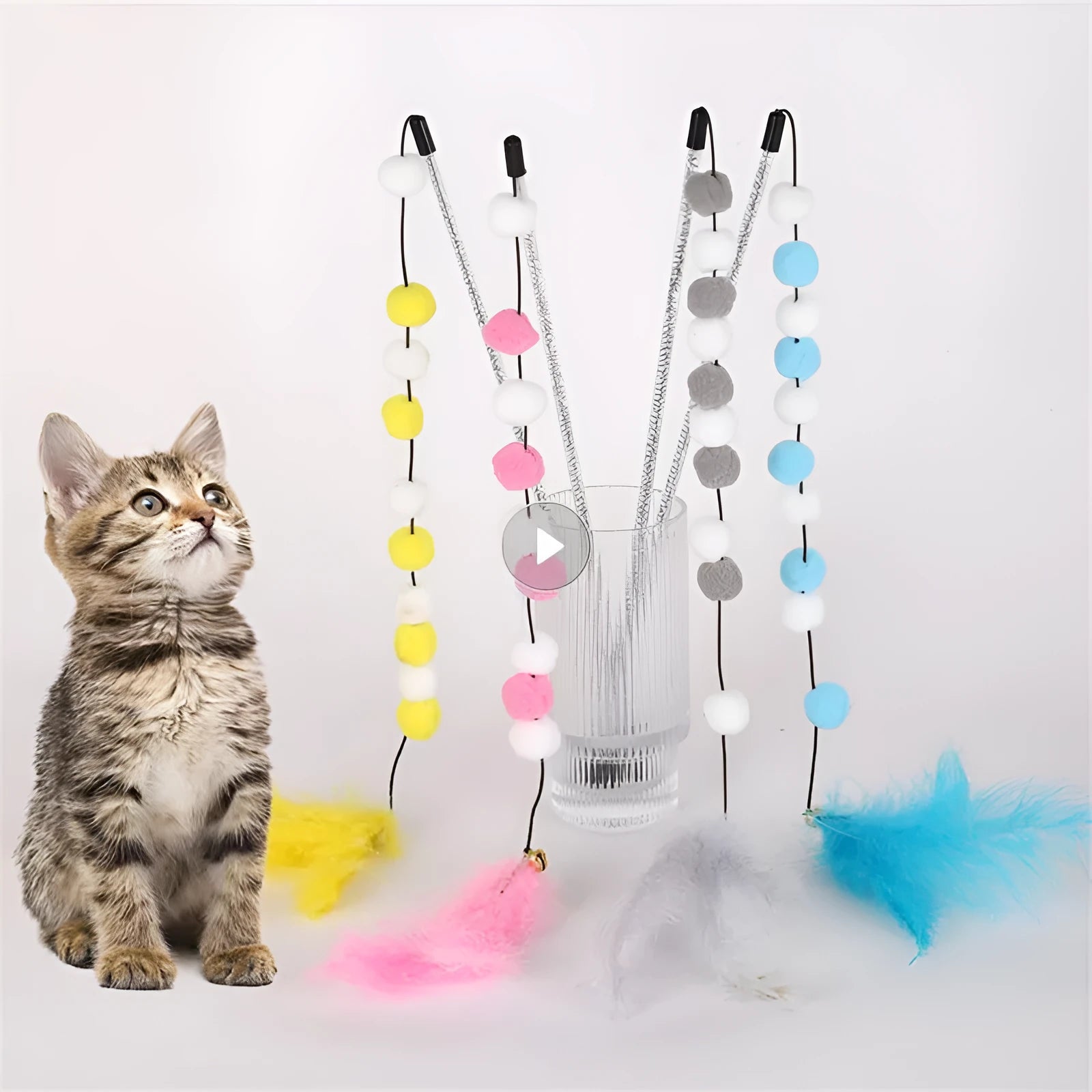 31cm long grey, yellow, and blue acrylic pompon cat teaser rod with feathers and a bell.