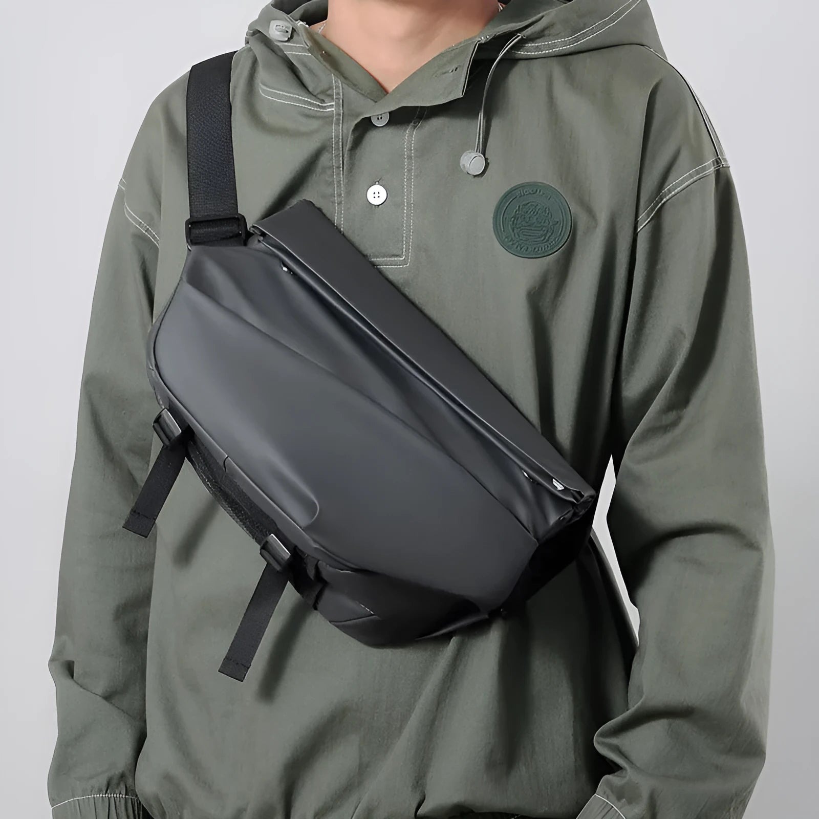 Men's grey PU crossbody bag with shoulder strap showing internal organisation compartments