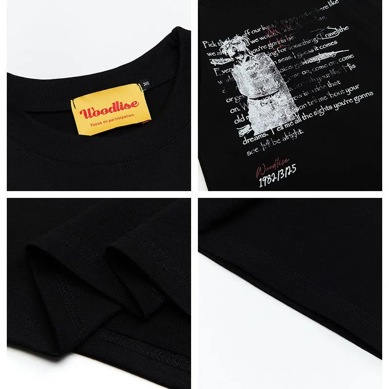 Men's black pure cotton loose T-shirt with white letter print and short raglan sleeves.