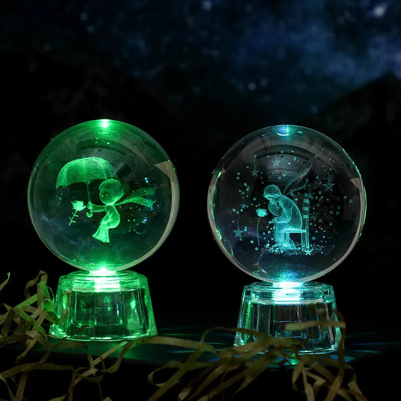 Transparent white crystal ball ornament with inner carving design measuring 6cm in diameter