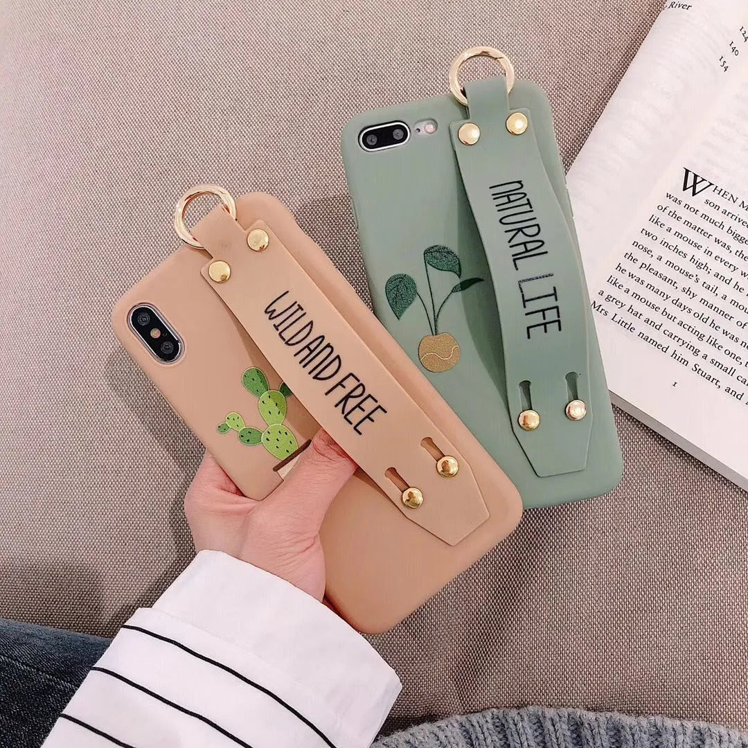 Green wristband holder phone case for iPhone showing integrated finger loop and protective back cover design