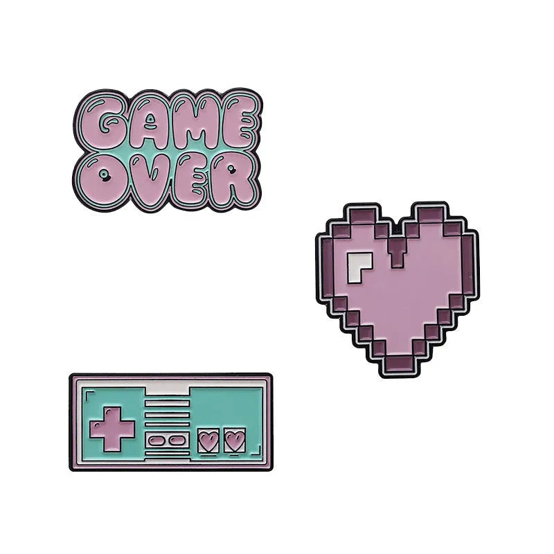 Alloy game console badge with magnetic backing in CC1122, CC1123, and CC1124 colour options