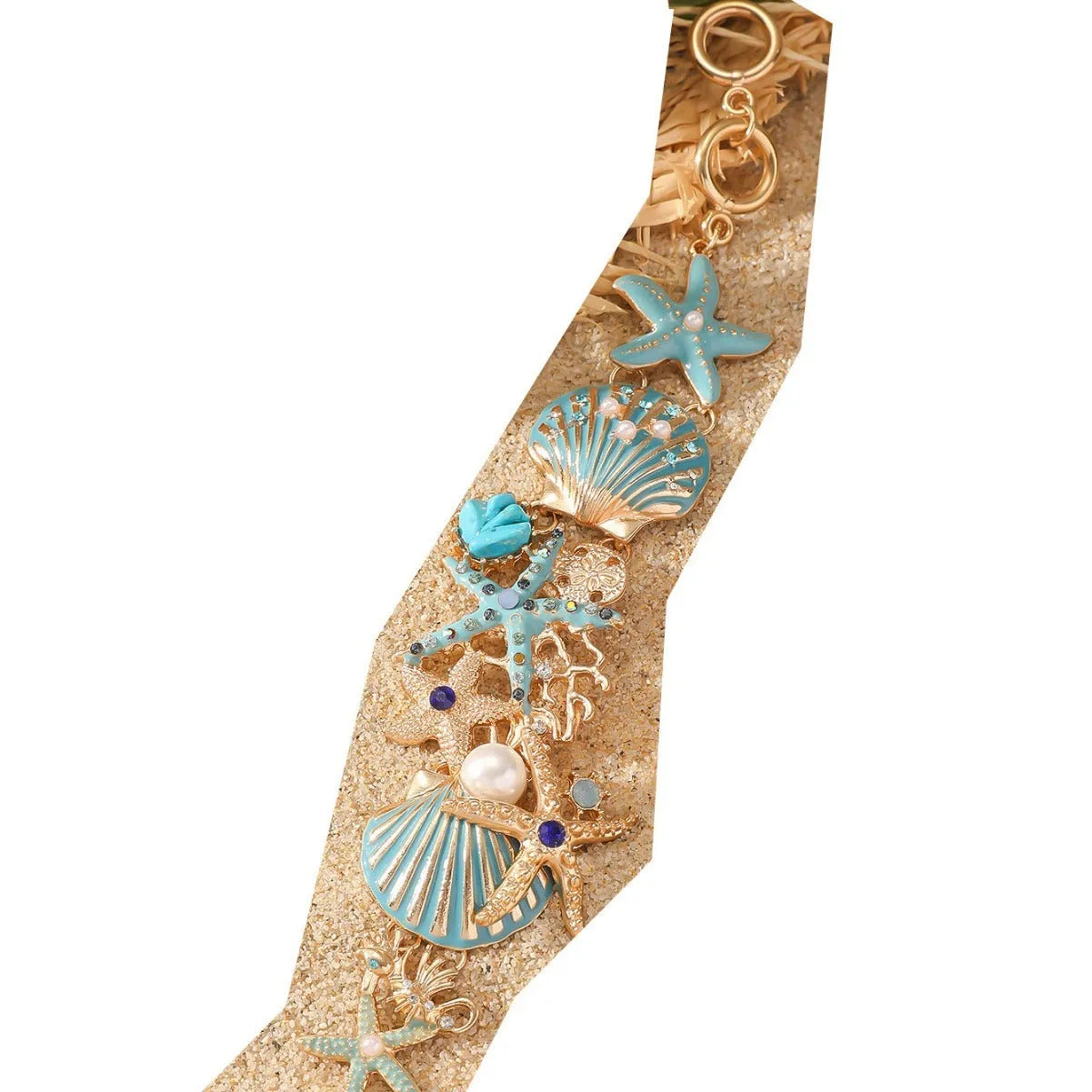 Women's alloy bracelet with marine shell, boat anchor, and starfish design in blue, red, or turquoise.