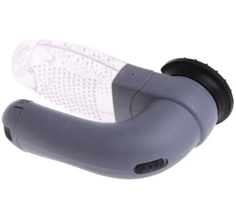 Grey handheld electric pet hair remover and massaging brush with soft rubber head.