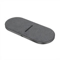Black wireless charging pad pair showing two flat charging surfaces with indicator lights