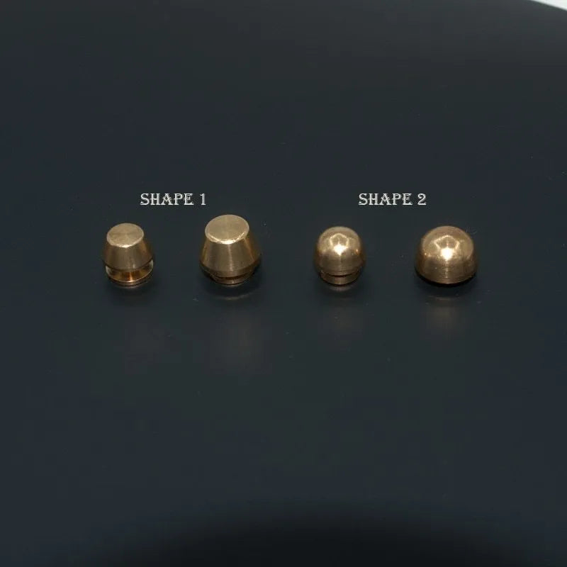 Brass decorative buckle foot nails in round and geometry bucket designs, sizes 10x6mm and 12x7mm.