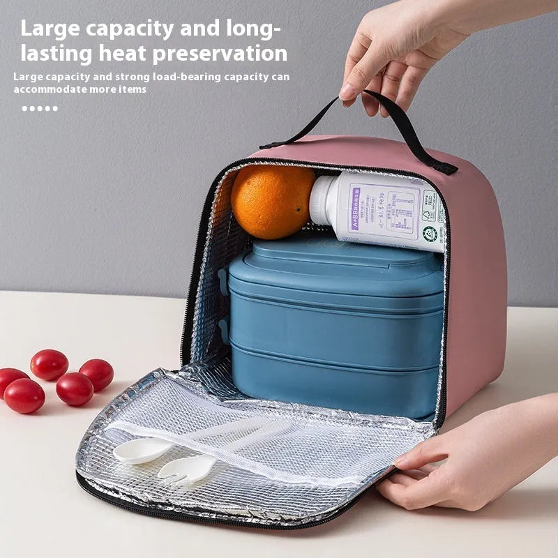 Large insulated lunch box bag in textured cloth, shown in blue colour with a bento box inside.