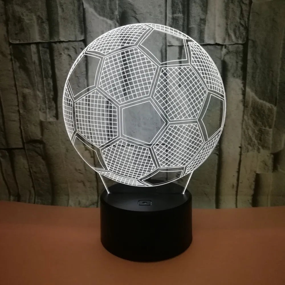 3D football night light with acrylic panel on ABS base, showing colourful projection.