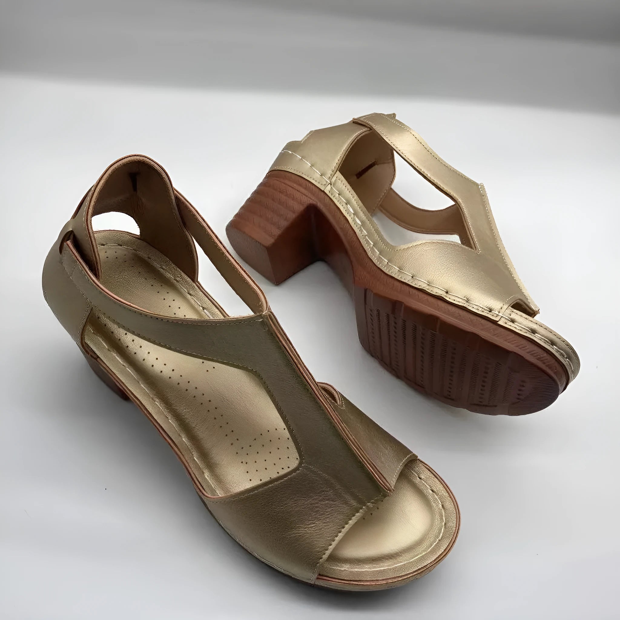 Women's plus size peep toe wedge sandals with Roman straps and a buckle in light brown.