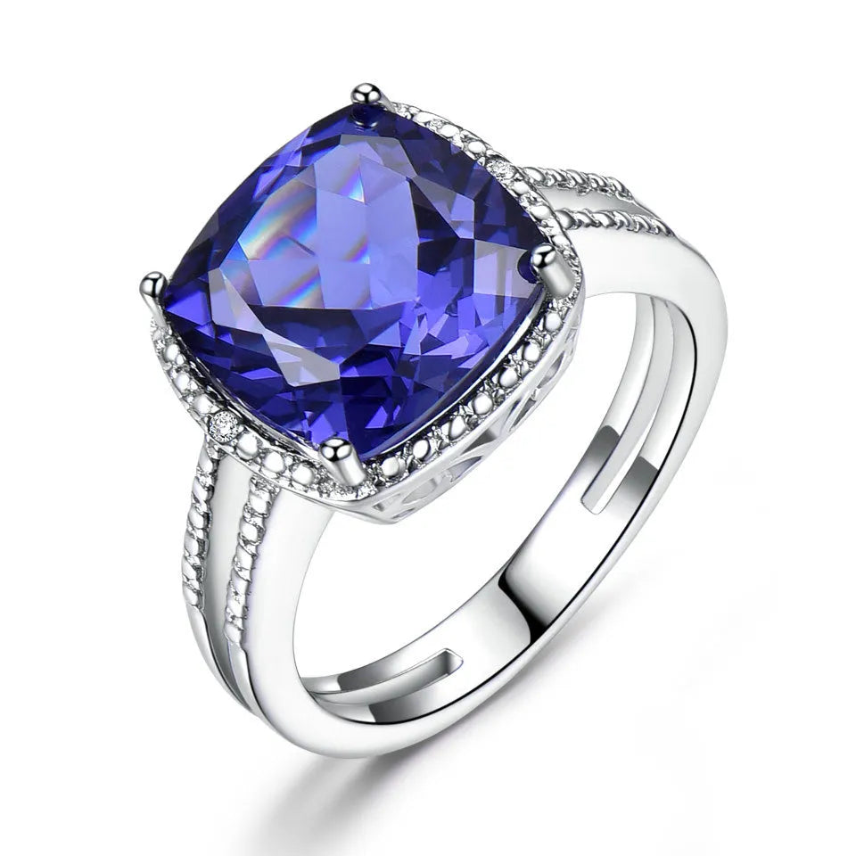 Women's sterling silver ring with blue Tanzanite gemstone, available in sizes 6 to 10