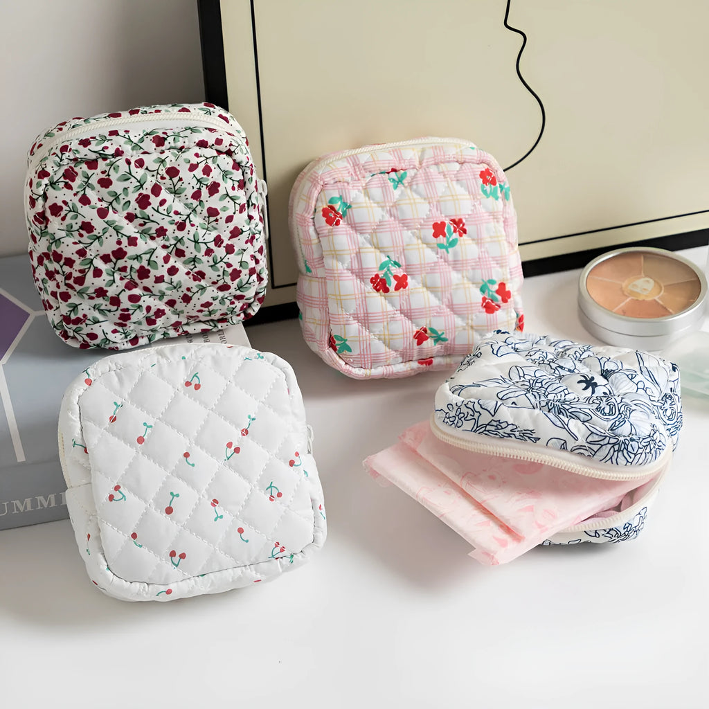 Ladies key storage bag in breathable polyester with floral patterns and sewing thread details