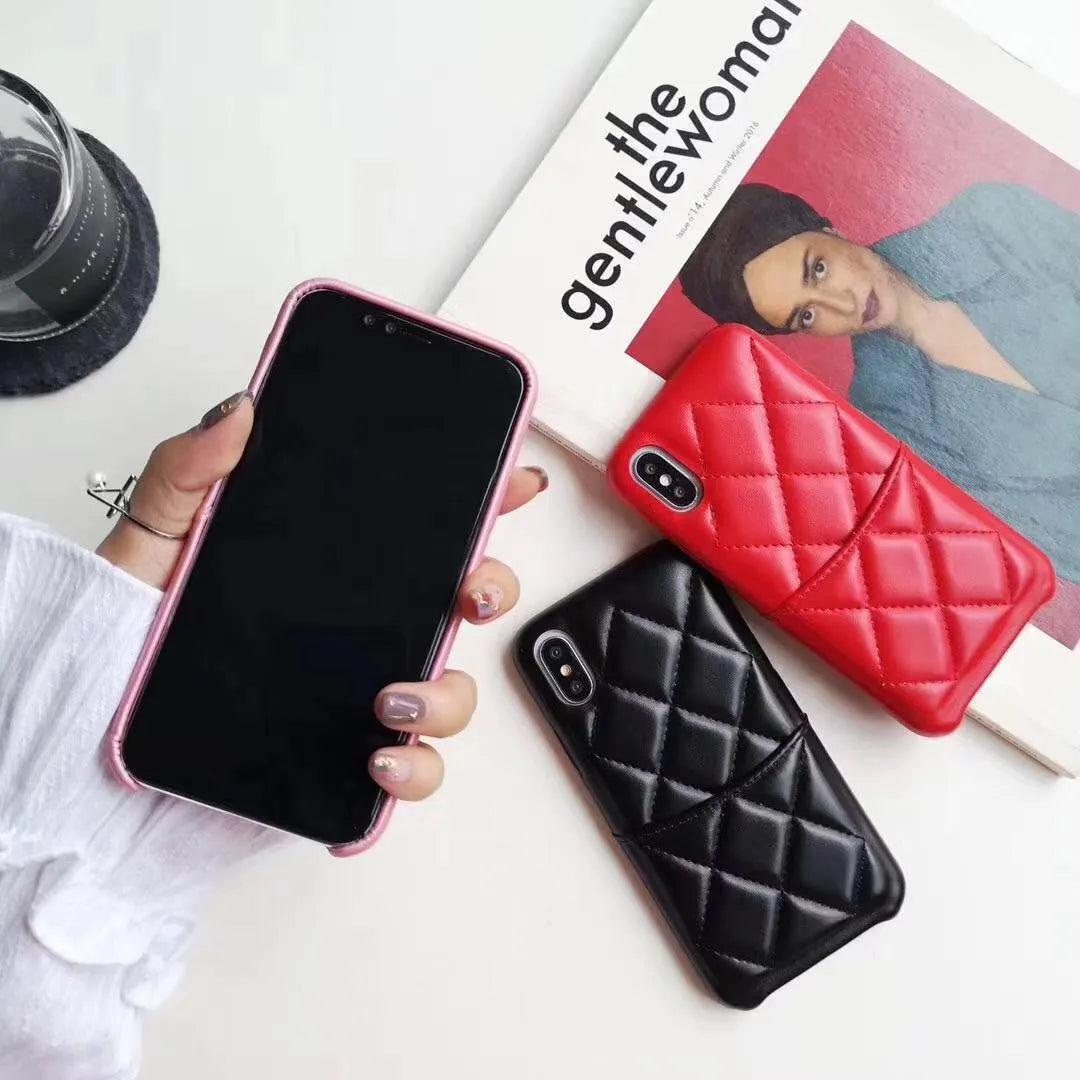 Black leather mobile phone case for iPhone XS Max on a table