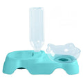 Tilted elevated cat bowl feeder with non-slip support in blue, pink, or white, made from non-toxic material