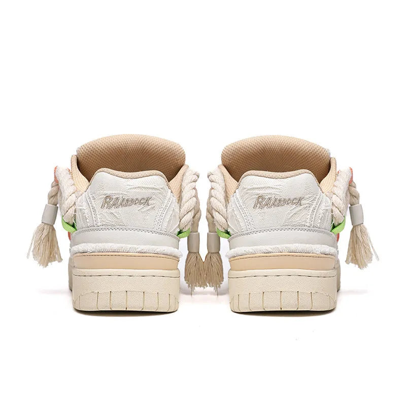 Creamy white low-top retro skate shoes with candy-colour sewing thread details on microfiber upper.