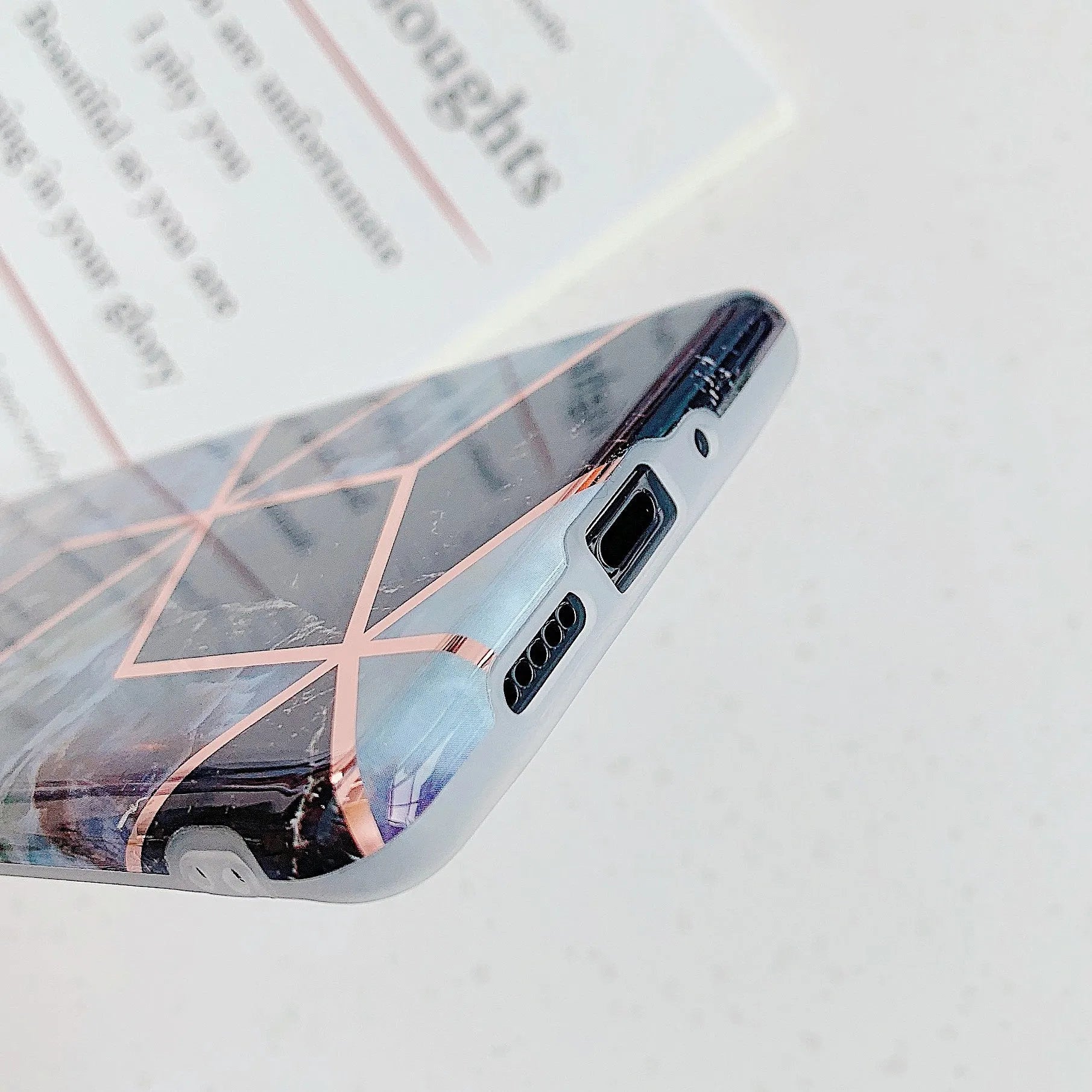 Electroplated marble mobile phone case with holographic finish on smartphone