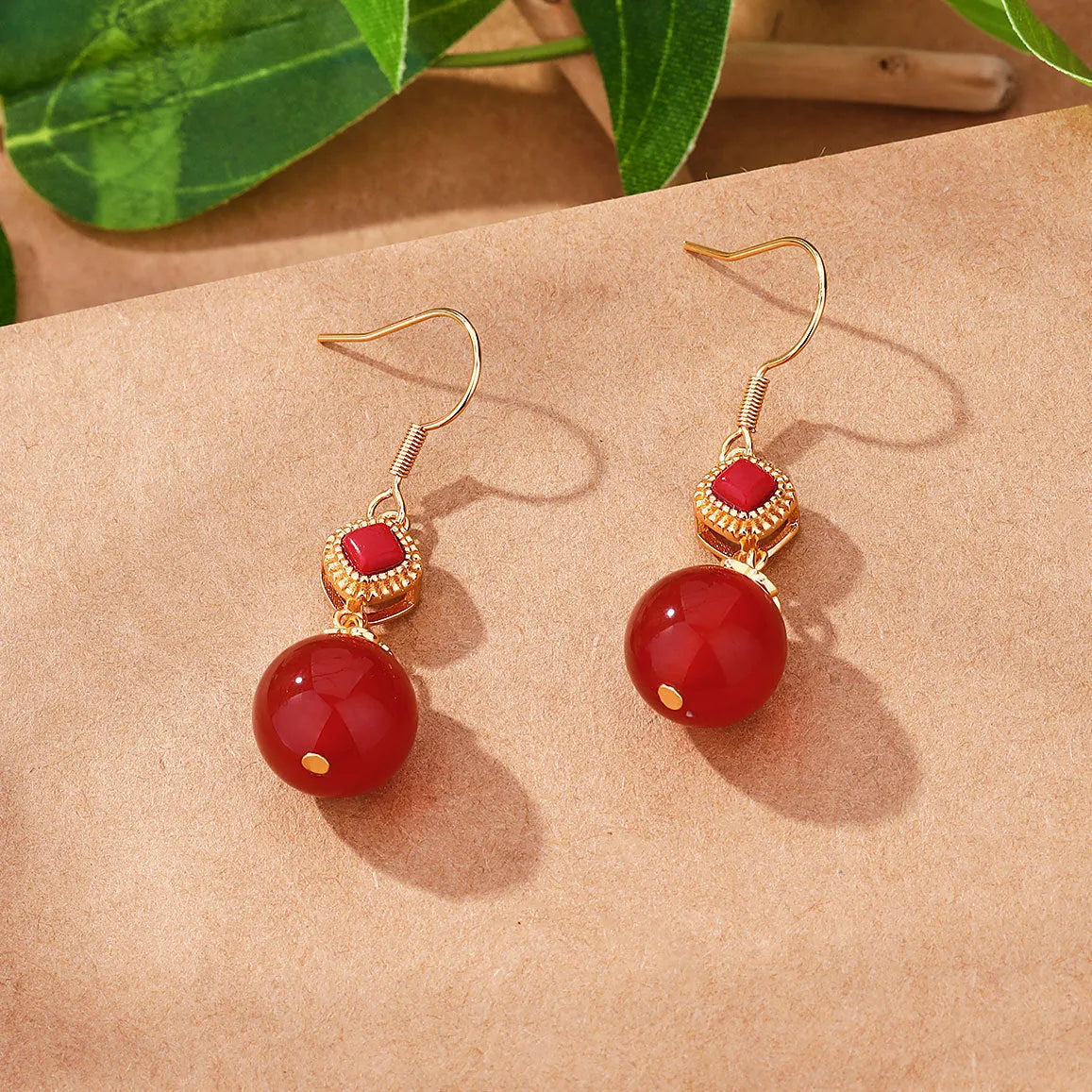 Southern red agate round bead earrings with S925 silver inlaid jasper geometric design on copper alloy