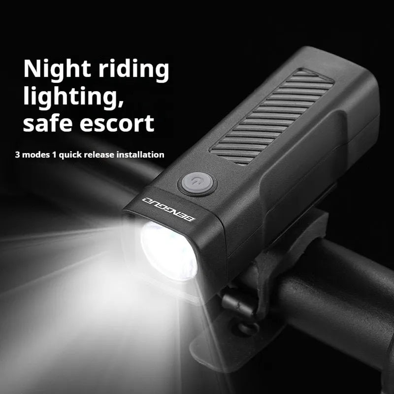 USB rechargeable bicycle headlight with quick-release strap bracket on handlebars.