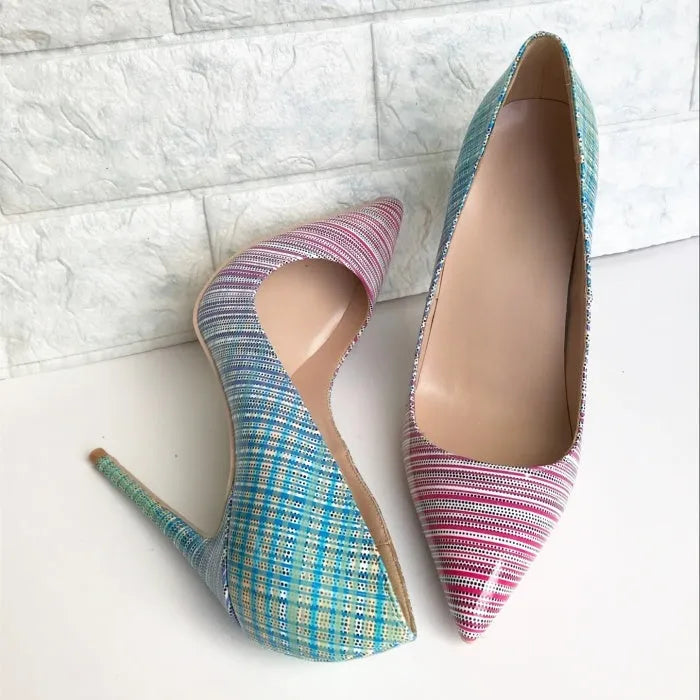 Ladies pink blue gradient patent leather pointed toe high heels on a white background