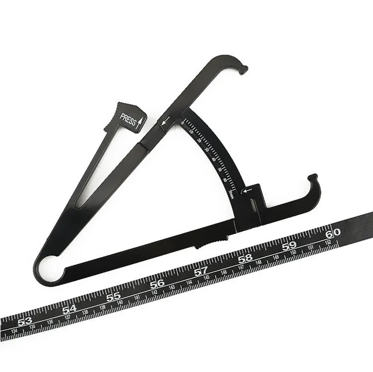 Black ABS body fat caliper with measurement tapes for skin fold thickness analysis