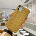 Wooden iPhone case with natural wood grain back cover showing rosewood, teak, black rose, and walnut colour options