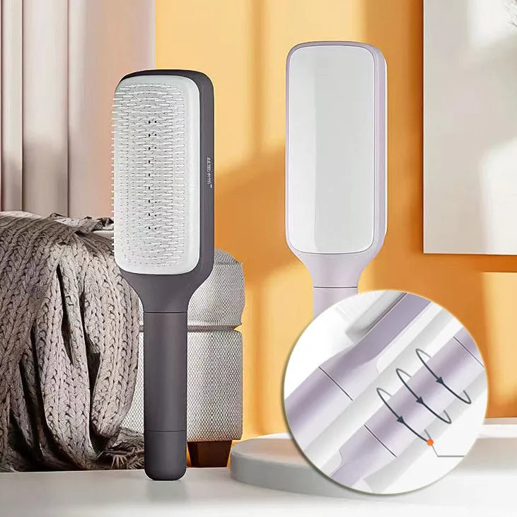 Roland purple self cleaning hair brush with rotating handle and anti-static bristles